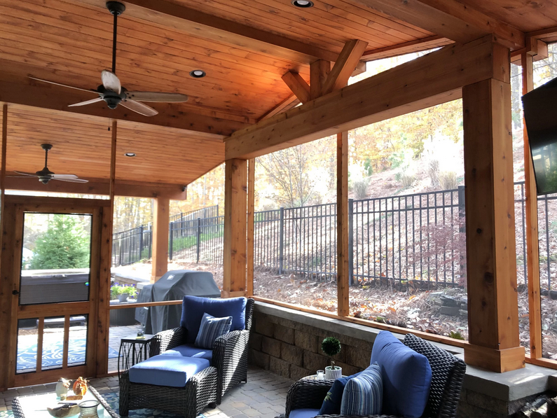 The inside of a porch utilizing screens, some of the best deck shade ideas