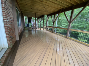 A newly constructed deck that features a deck shade option