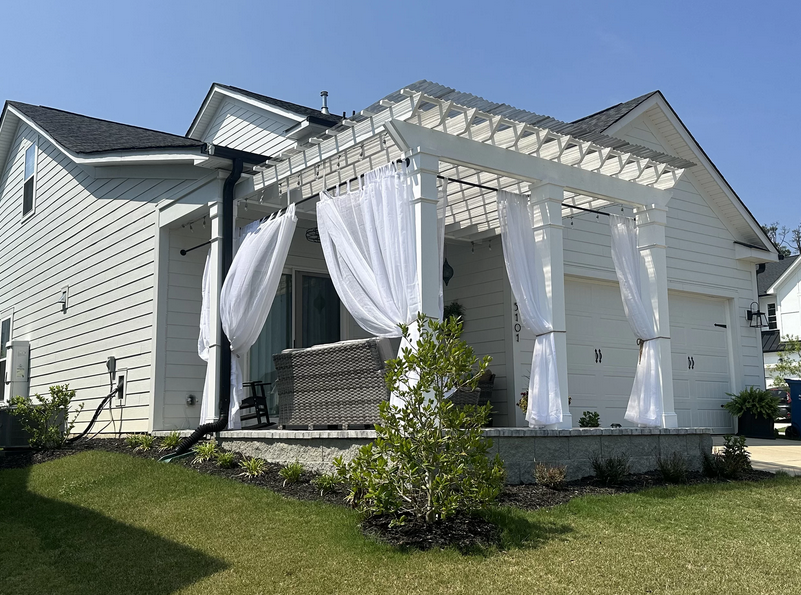  A homeowner shading a deck with a pergola