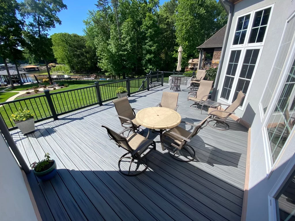 A hardscaping service in Newell, NC, completing a deck with a table and chairs