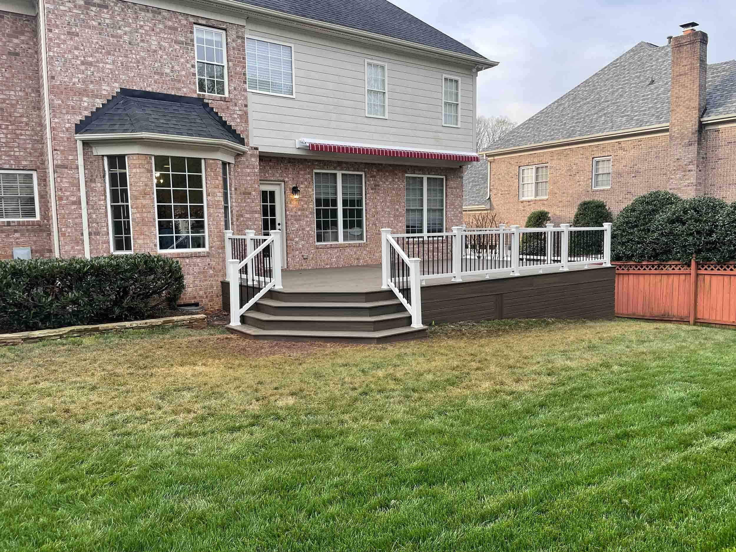 A brown deck built by a company offering hardscaping services in Matthews, NC